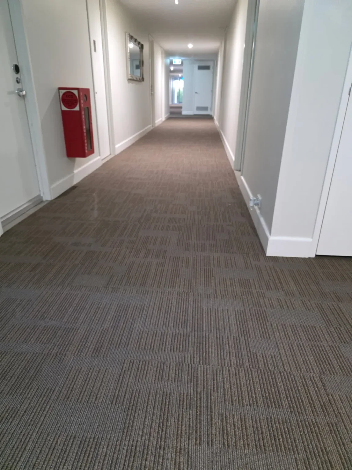 Commercial carpet in a hotel guest corridor, from Airlay’s project library