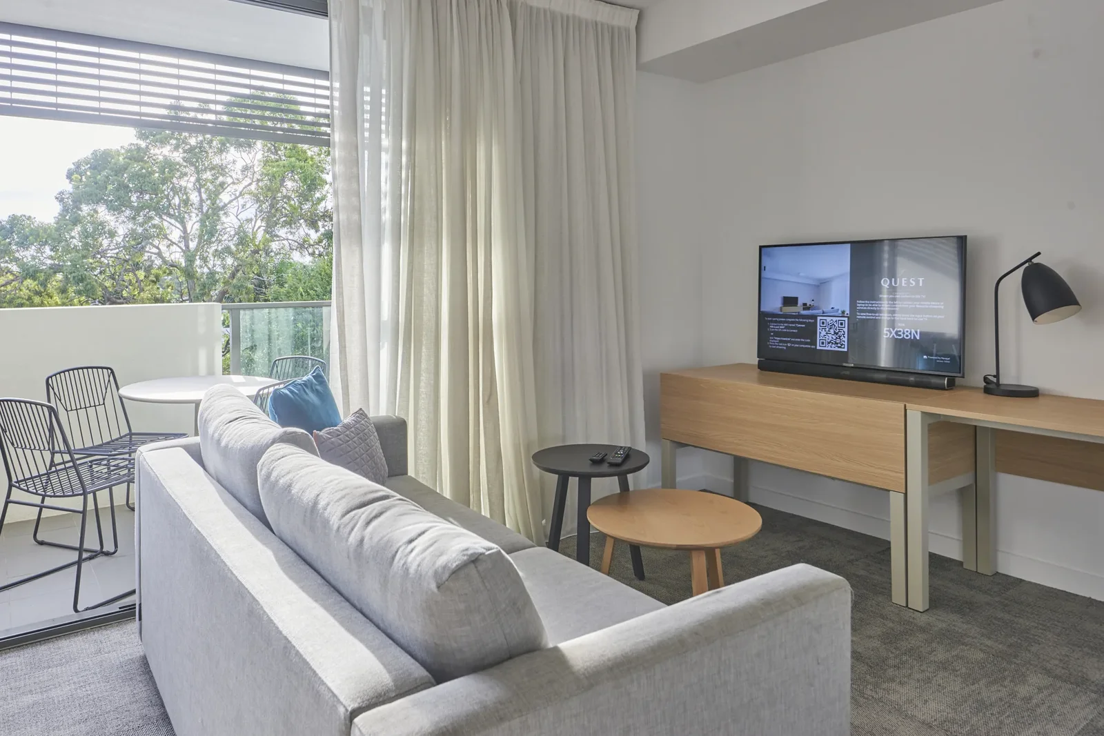 Commercial carpet in the Quest Cannon Hill apartment living area — Airlay project photography